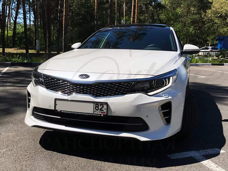 KIA Optima (white)
