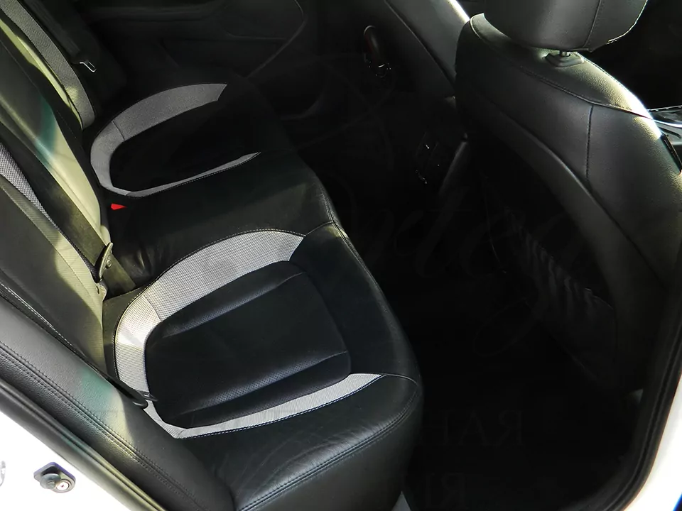 KIA Optima (white)